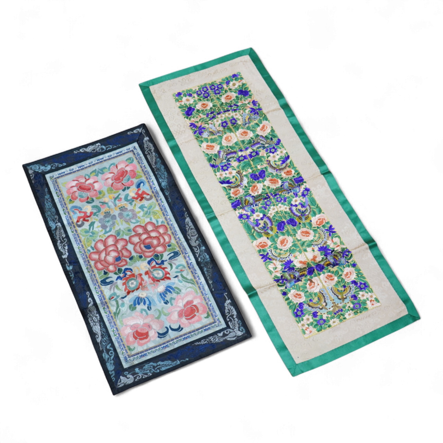 Two pairs of Chinese late 19th / early 20th century polychrome silk embroidered sleeve bands, now converted into two decorative table runners, one embroidered with large flowers using Peking knot, the other heavily embro